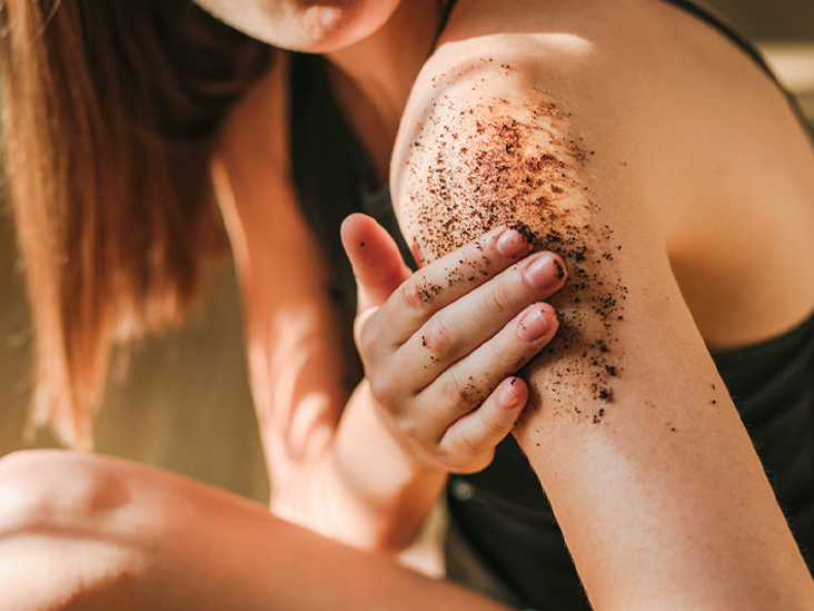 Woman Applying Coffee Scrub